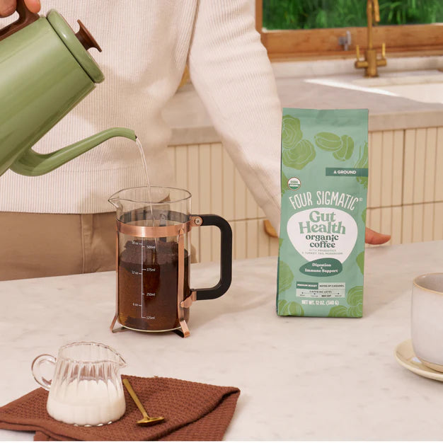 Four sigmatic HAPPY GUT Organic Ground Coffee with Probiotics & Turkey Tail Mushrooms
