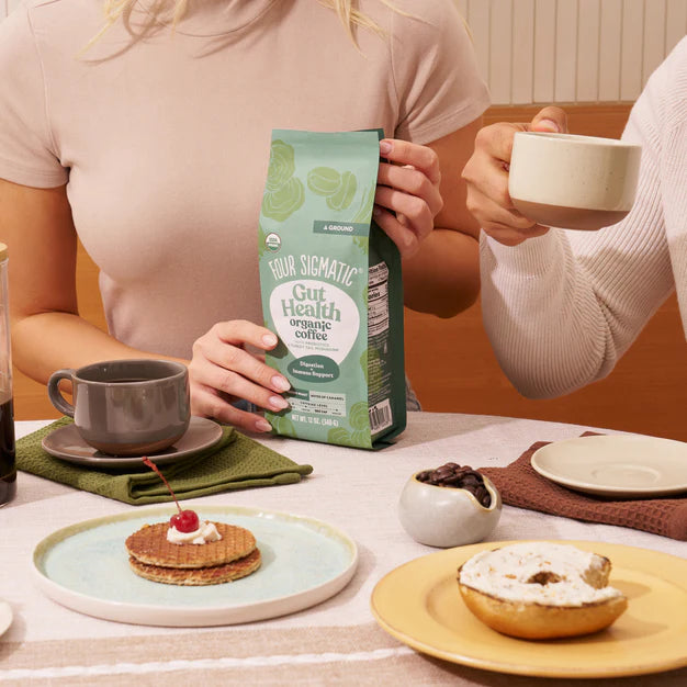 Four sigmatic HAPPY GUT Organic Ground Coffee with Probiotics & Turkey Tail Mushrooms